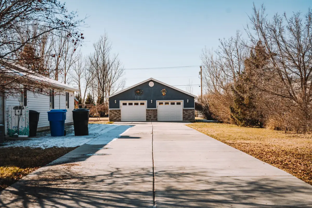 A driveway cleared and swept after a debris cleanup